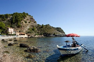 The pace of life is a little slower in Italy's deep south; here, the coast near Taormina, Sicily.