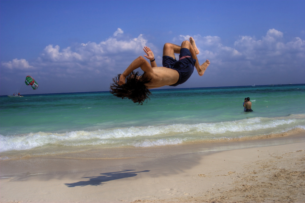 A vacationer flips for Playa del Carmen beach