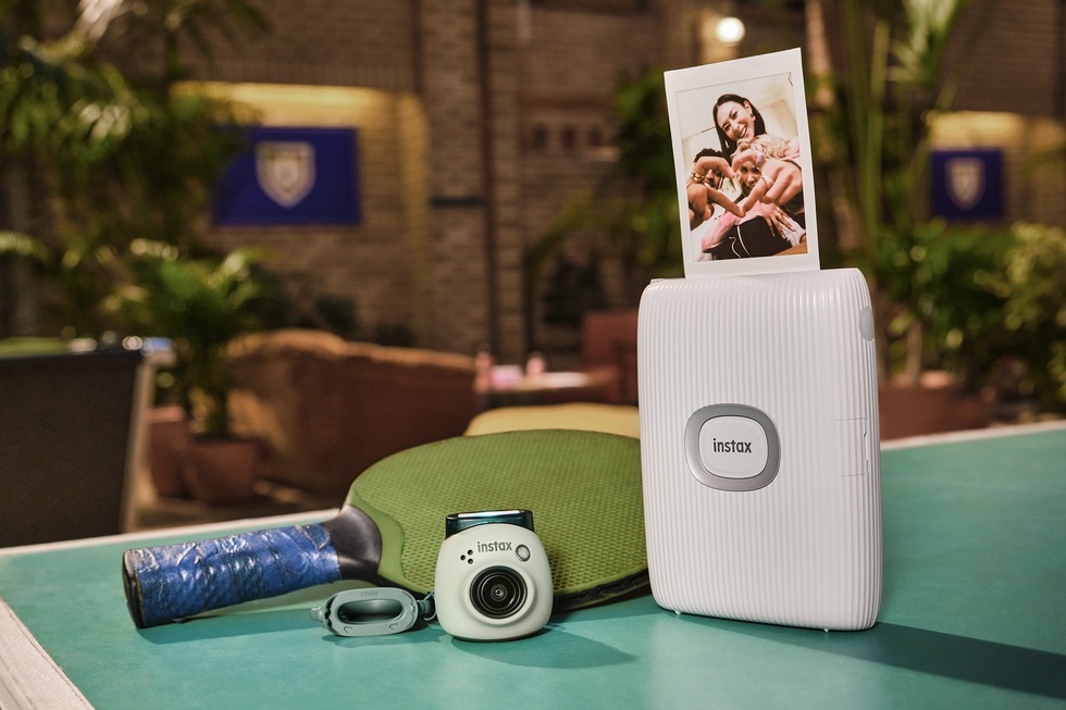 the best travel products for 2023: Fujifilm Instal Pal Digital Camera and Mini Link 2 Smartphone Printer Bundle