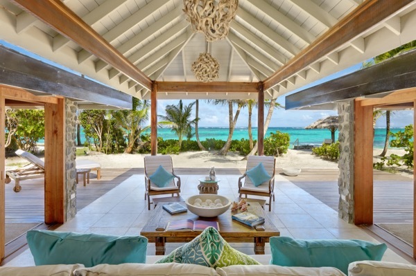 The veranda/living rooms of the Petit St. Vincent resort are open to views of the ocean.