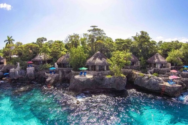 The villas of Rockhouse in Negril, Jamaica are built right to the sea cliff's edge.