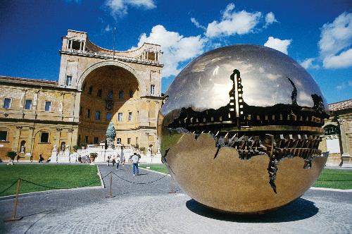 A view of the Vatican Museum in Rome, dominated by the golden sphere that stands outside,