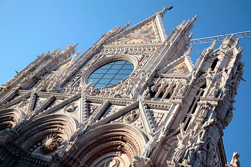 Siena's Duomo is striking, from its Romanesque-Gothic facade to its marble-striped, exuberantly decorated interior.