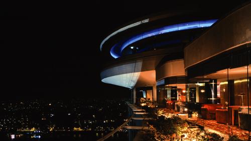 The Revolving Restaurant lit up at night