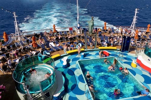 Lounging in a pool aboard Carnival Dream.