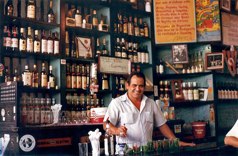 A bartender preparing mojitos at La Bodeguita del Medio in La Habana, Cuba