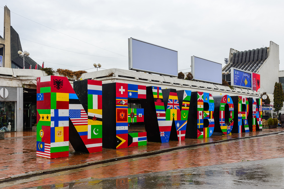 Newborn Monument at Downtown Pristina, painted with flags of the countries that have recognized Kosovo