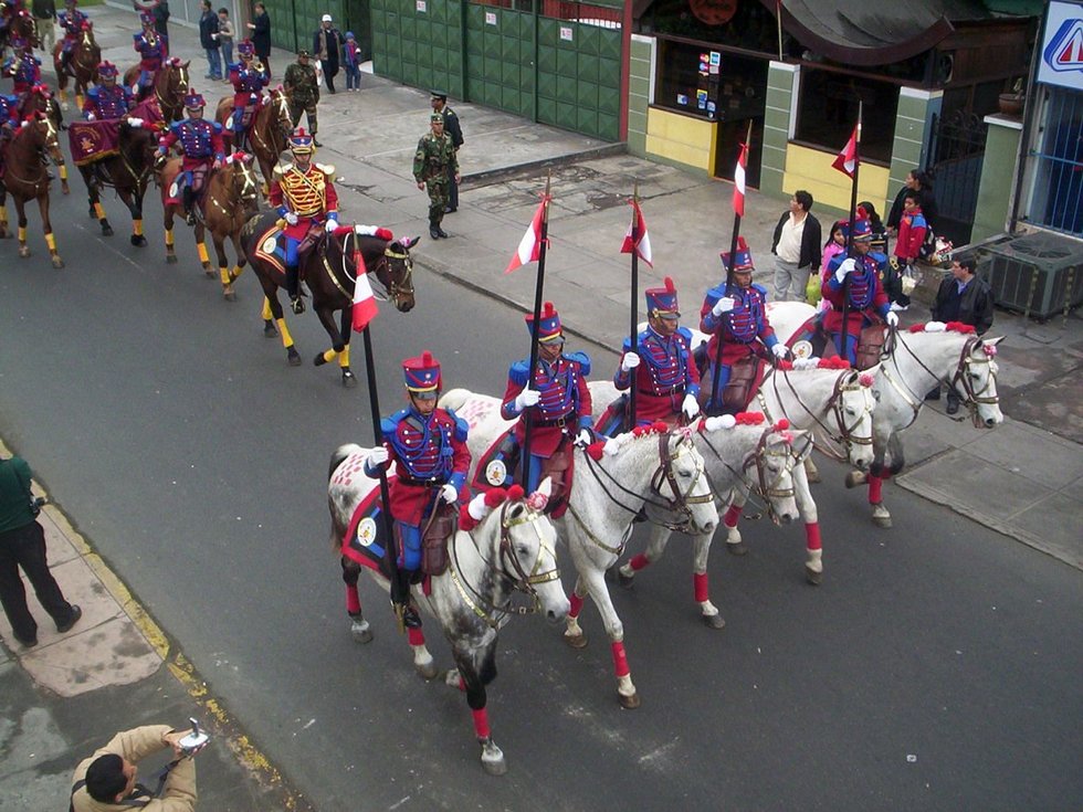 Peruvian horsemen parade during an Indendence Day celebration in Lima