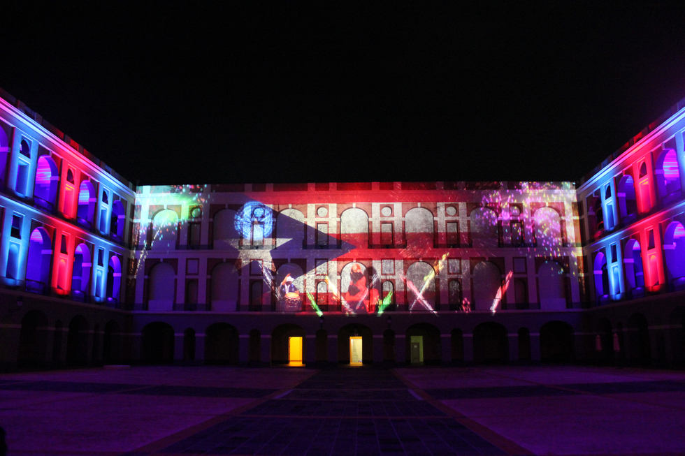 3D lightshow depicting Puerto Rican history and culture is projected onto the walls of Cuartel de Ballajá