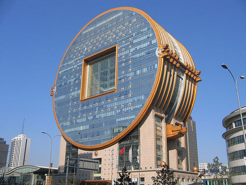 This office building in Shenyang looks like an ancient coin and is houses multiple banks and businesses. 