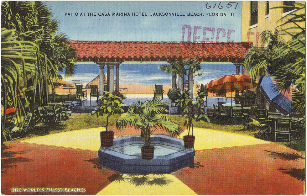 A postcard of the courtyard inside the 1925 Casa Marina hotel. 