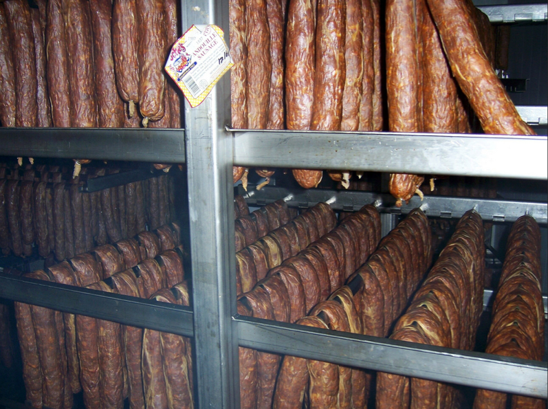 Andouille Sausage in the smoker at Poches Market and Restaurant