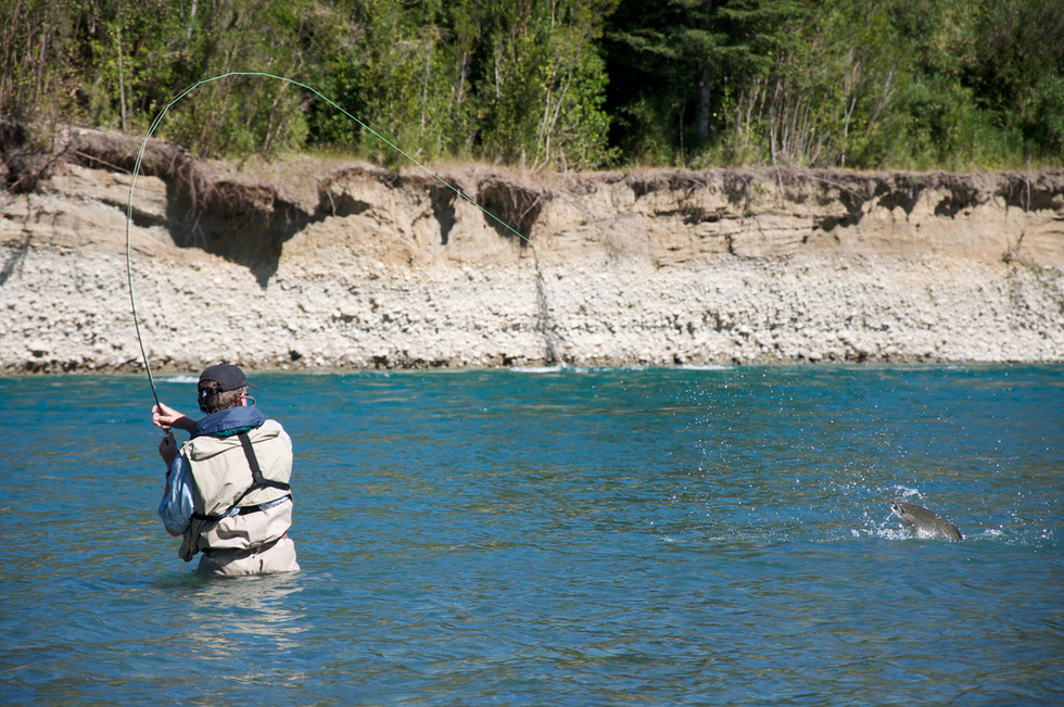 A man fly-fishing in a Chilean river