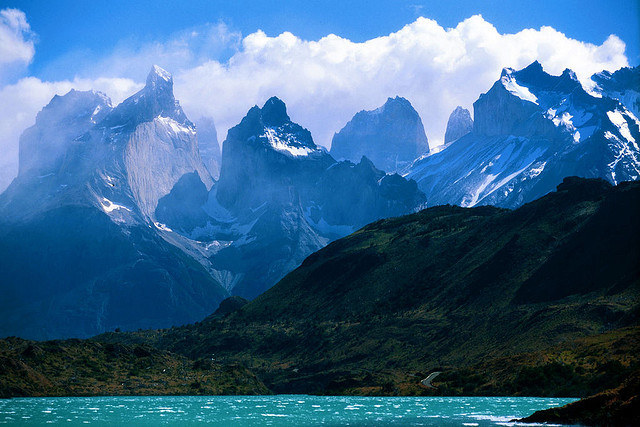The towering mountains of Torres del Paine, pictured over a dazzling blue lake