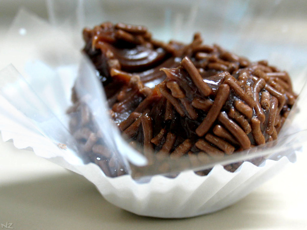 Brigadeiro with a bite taken out of it