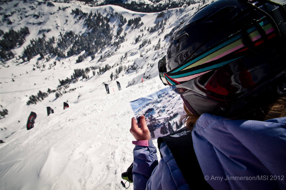 A snowboarder prepares to challenge a steep slope at Kirkwood snow park.