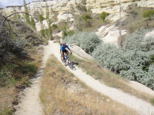 A photo a biker riding a trail in Cappadocia 