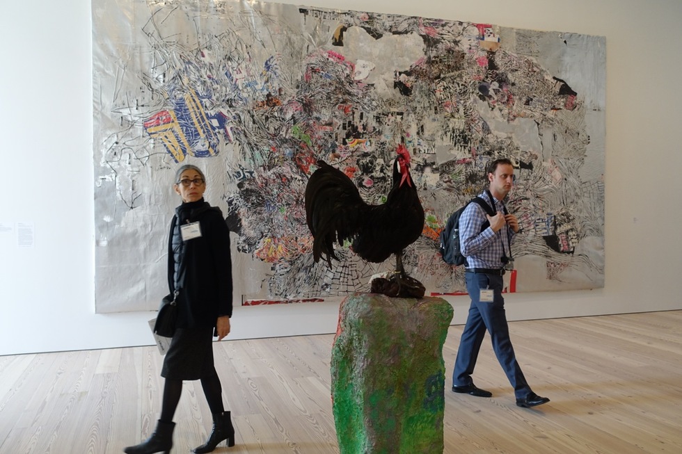 Two visitors eye the art at the Whitney Museum