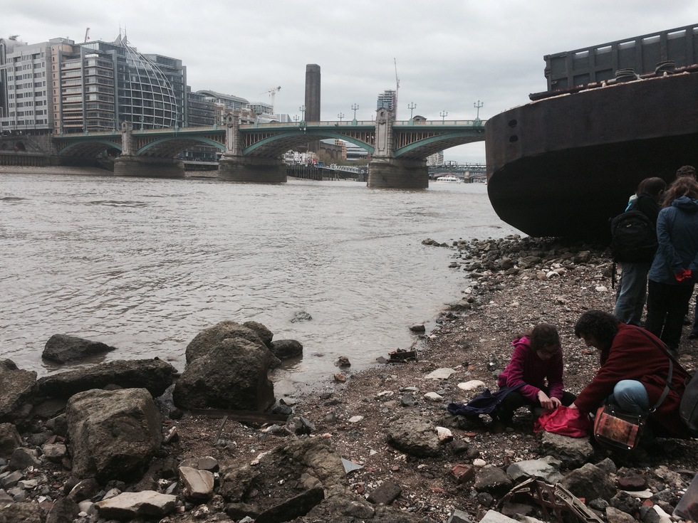 Family mudlarking on the Thames