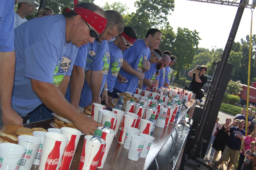 Competitors eat slugburgers at the World Slugburger Championship. 