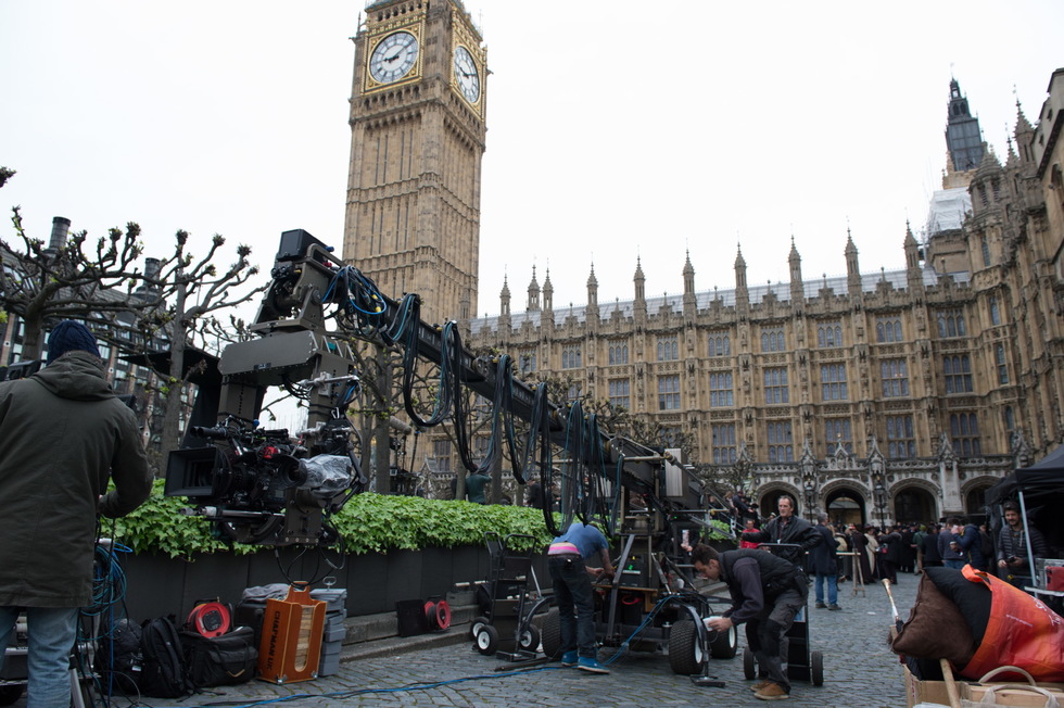 A camera and crane sit outside of Parliament on the set of director Sarah Gavron’s Suffragette, a Focus Features release. 