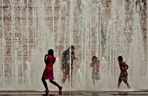 Children play in the water in Puerto Rico.