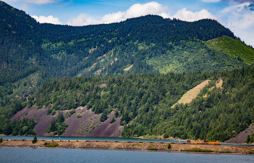 The Columbia River Gorge is <a href="../../../destinations/portland-or/">Portland</a>&rsquo;s playground, and there&rsquo;s a daily Amtrak train which takes you there, every afternoon. The short trip from <a href="../../../destinations/portland-or/">Portland</a> to Bingen, WA takes an hour and a half, and puts you just a short cab ride away from <a href="../../../destinations/hood-river">Hood River</a>, full of charming B&amp;Bs and walking paths. You can take the train back the next morning or wait for the afternoon&rsquo;s Greyhound bus, which costs about the same as the train. <a href="../../../images/destinations/maps/jpg-2006/2761_thecolumbiagorgeandhoodriverattractions.jpg">Our attractions map</a>&nbsp;gives you some great ideas of what to do in Hood River.