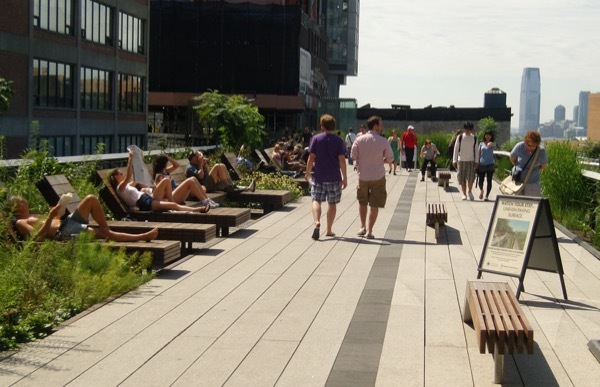 People stroll along the Highline in New York City