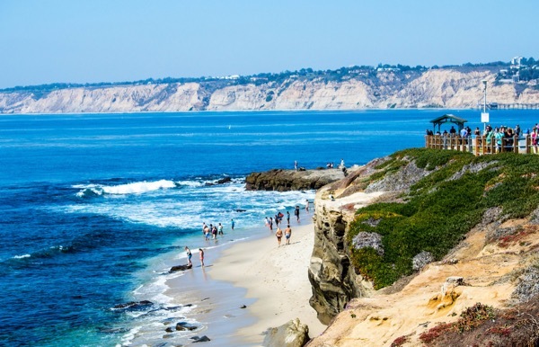 Vacationers enjoy La Jolla Beach Cove in California