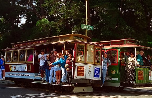 Tourists on a cable car in San Francisco