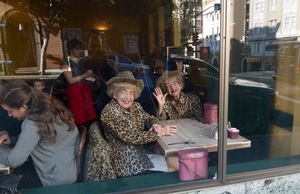 Twins in a diner in San Francisco, California
