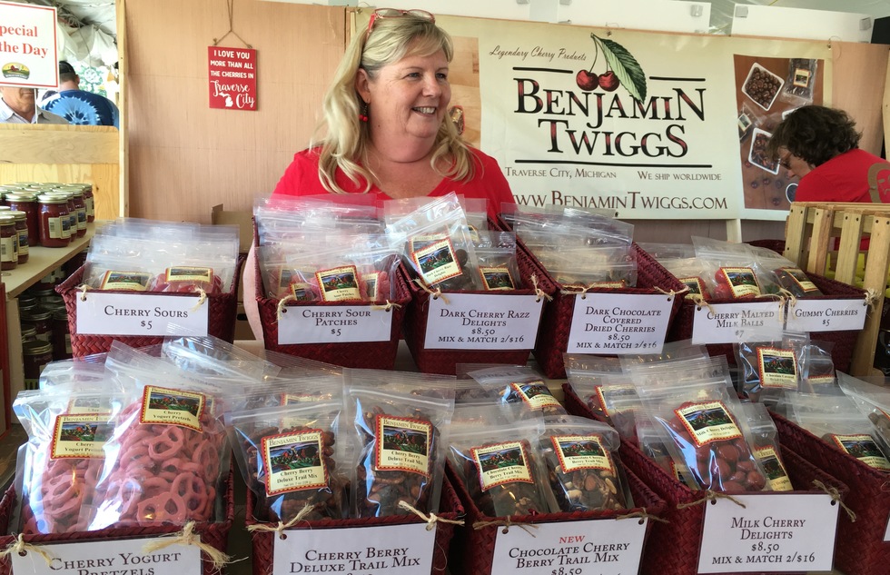 A woman sells cherry products of all sorts at the National Cherry Festival.