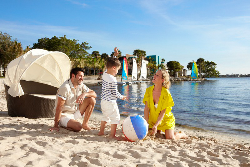 A family relaxing by the beach at Club Med Sandpiper