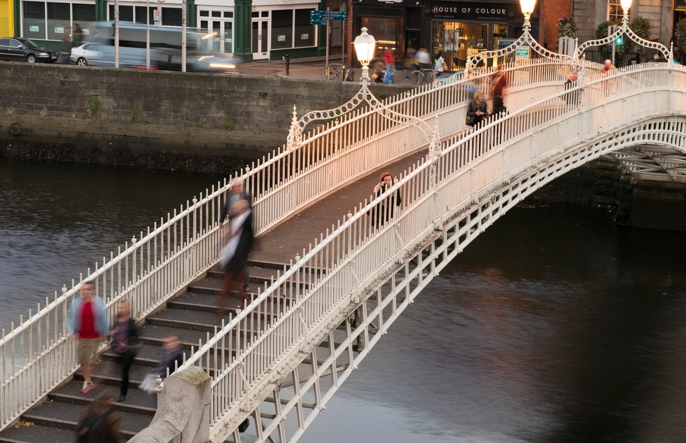The Ha'penny Bridge spans the River Liffey in Dublin