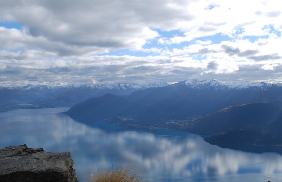 Lake Wakatipu and surrounding snow-capped mountains in Queenstown, New Zealand