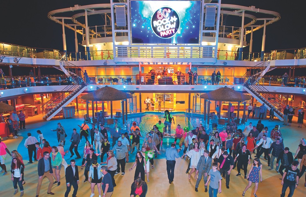 A party on the deck of the Carnival Vista.