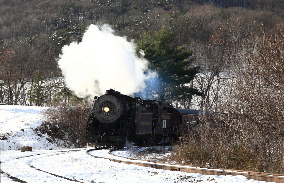 A train on the Western Maryland Scenic Railroad rounding Helmstetter's Curve 