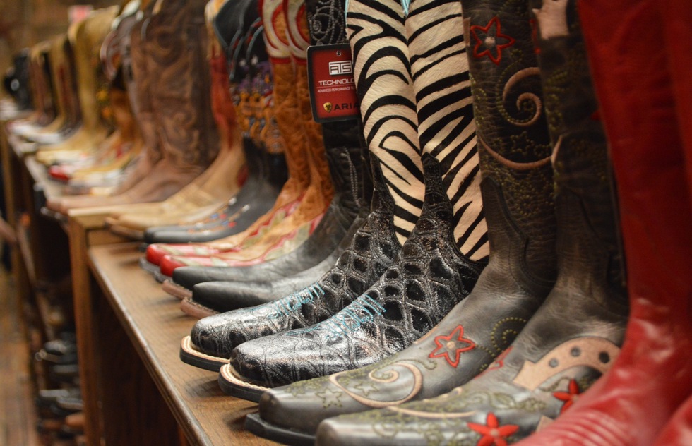 A row of cowboy boots for sale in Nashville, Tennessee