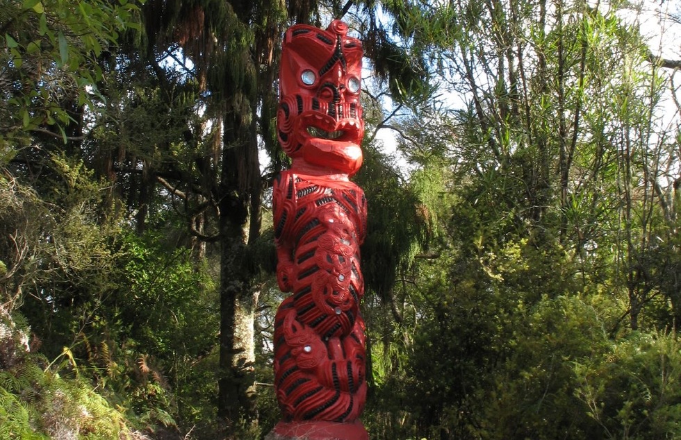 Wood carving at Te Puia, a Maori cultural center in Rotorua, New Zealand