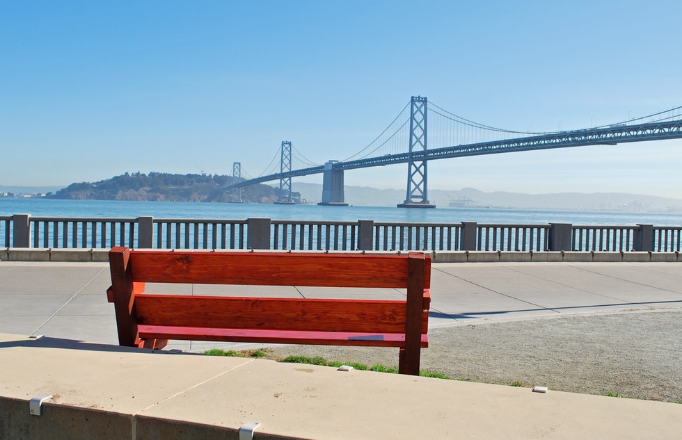 View of the Bay Bridge from the Embarcadero Promenade in San Francisco