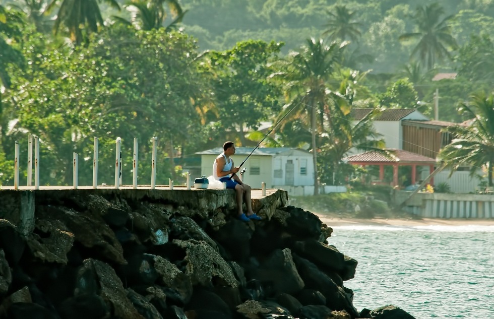 A fisherman at Luquillo Beach in Puerto Rico