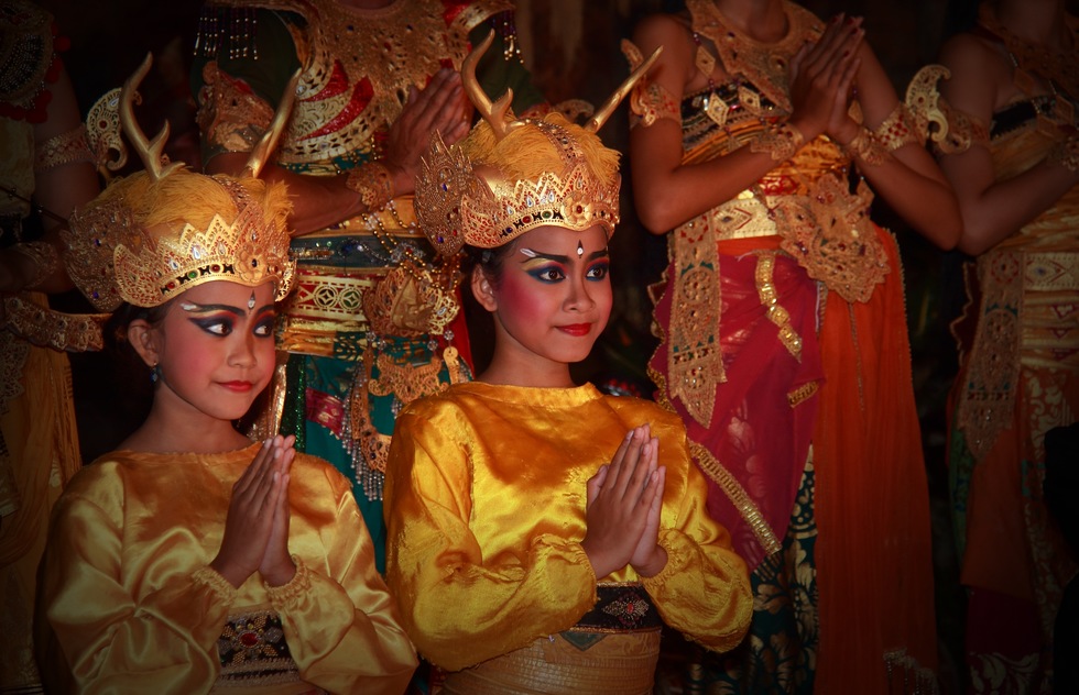 Two girls perform a dance version of the Ramayana in Bali, Indonesia