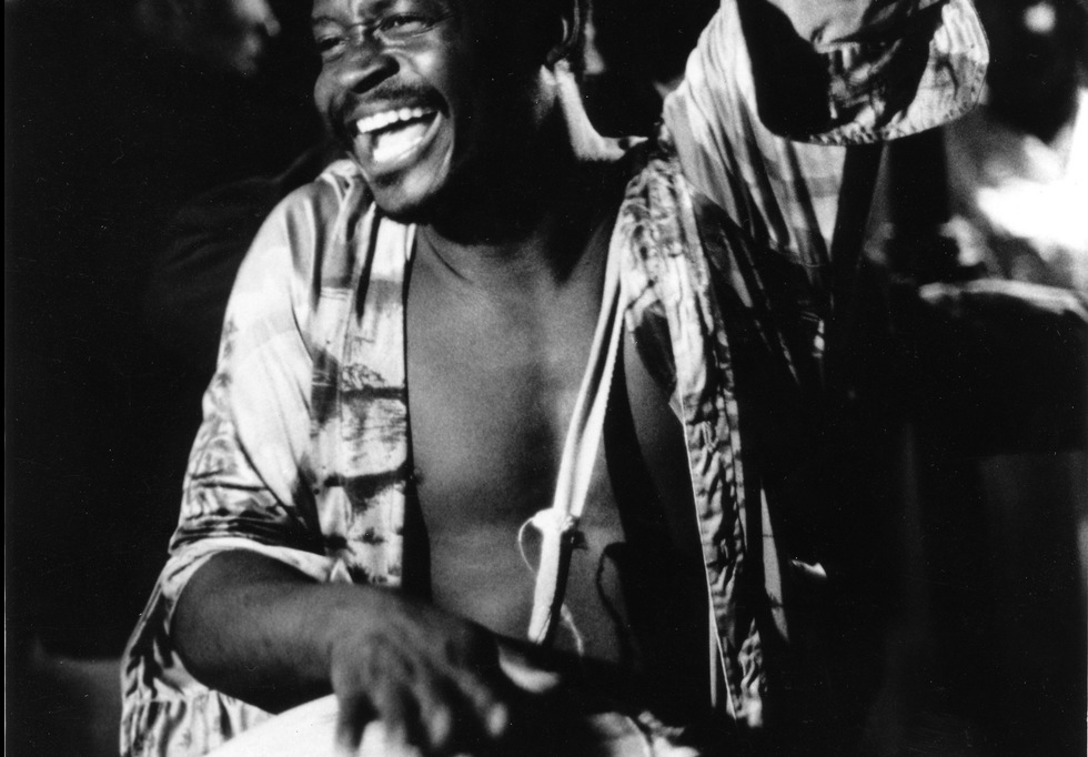 Early 1980s photo of a drummer at a Haitian vodou dance in New York City