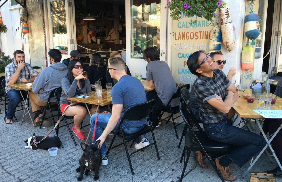A group dine out at a restaurant in Williamsburg, Brooklyn