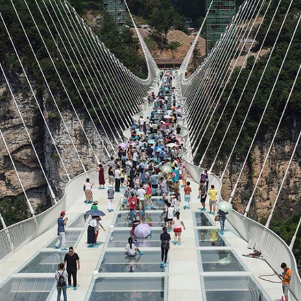World's Highest and Longest Glass-Bottomed Bridge Opens in China | Frommer's