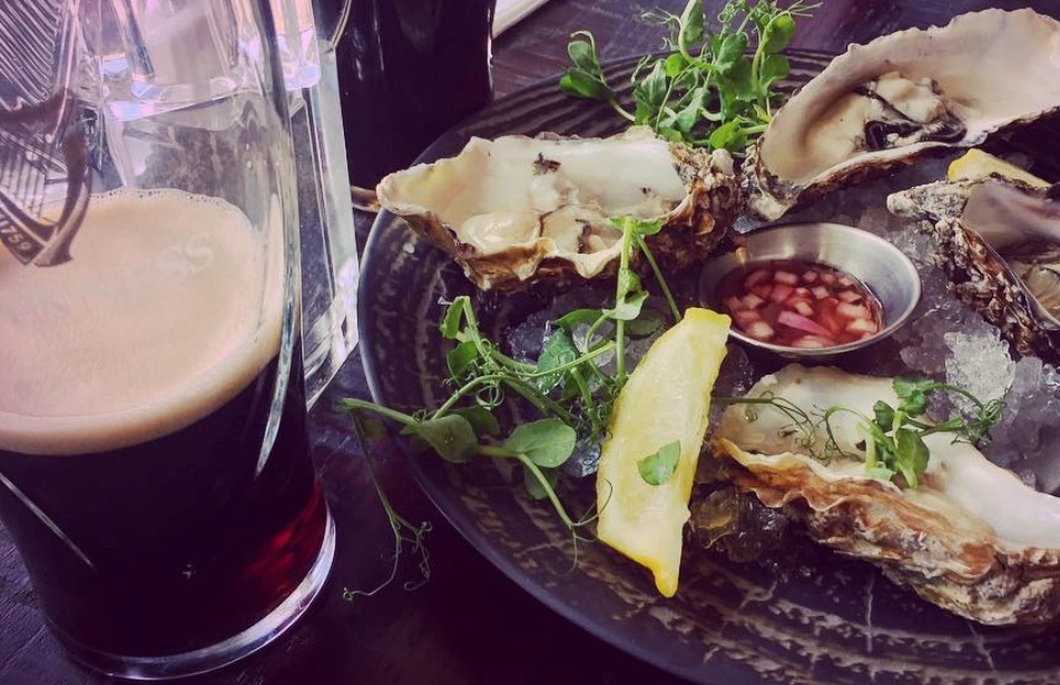 Guinness and oysters at the Guinness Storehouse in Dublin