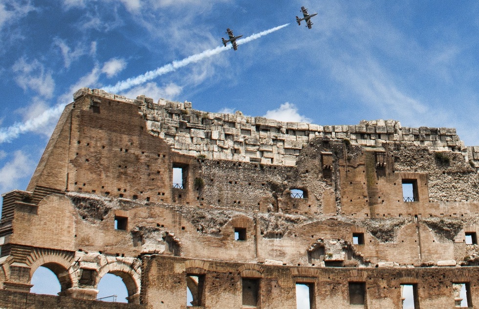 Two planes fly over Rome's Colosseum