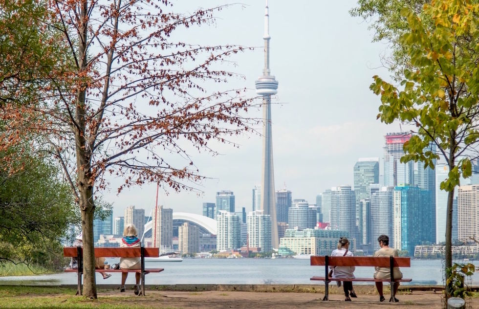 A view of the Toronto skyline from park benches on the Toronto Islands