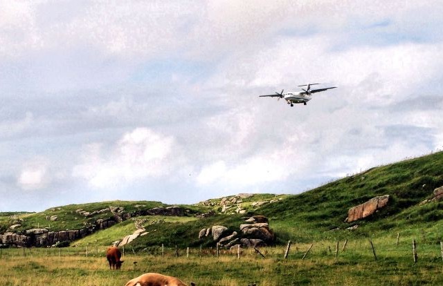 Plane over pasture in Donegal, Ireland