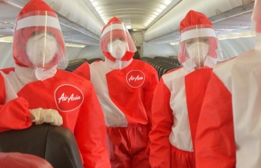 Look at the PPE Suits AirAsia Is Testing for Flight Attendants | Frommer's
